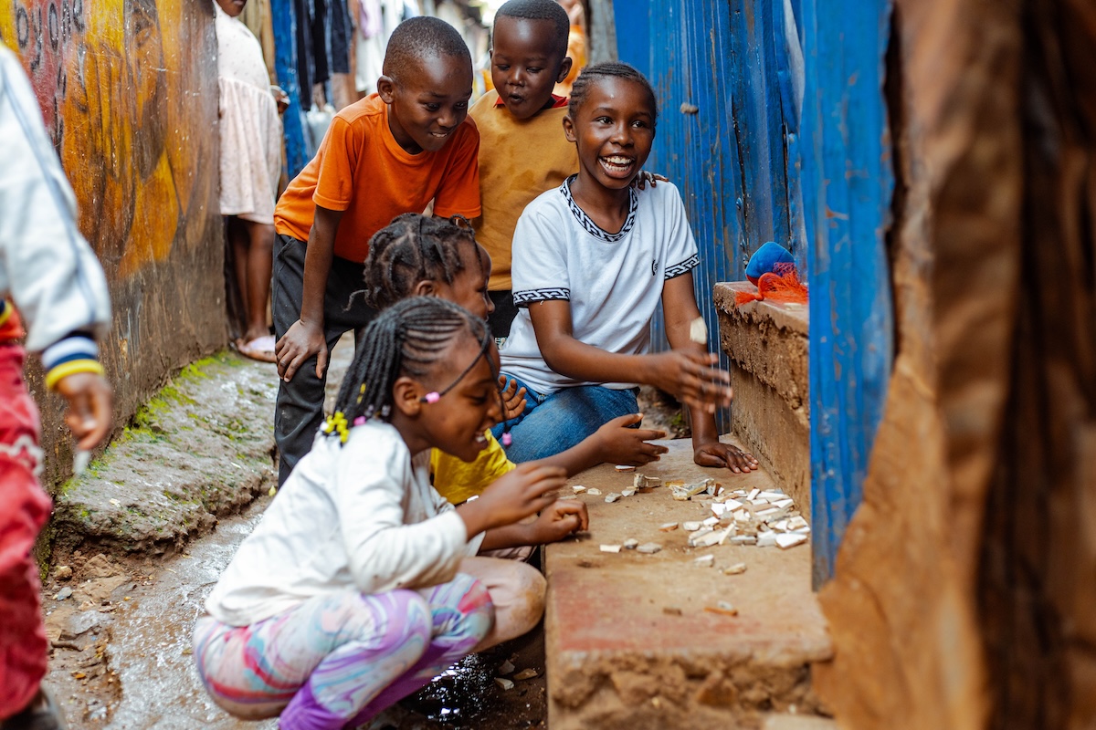 Children laughing and playing a game together